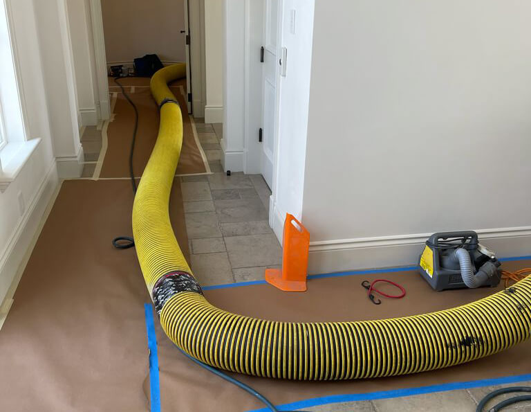 Water spraying from a burst pipe