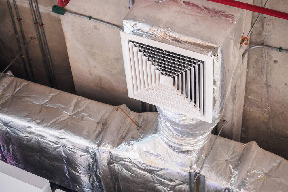 Large ceiling air duct system inside a commercial shopping mall