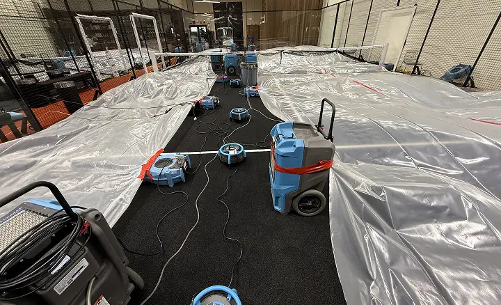 Restoration equipment set up on a job site floor