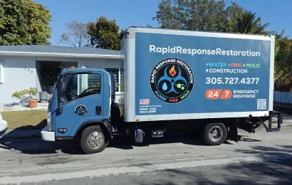 Rapid Response Restoration branded service truck on a Miami street